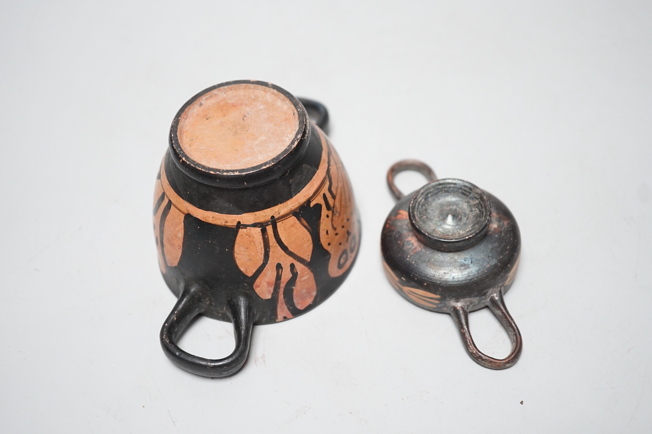 A 4th century B.C. South Italian Greek red figure bowl skyphos, together with another similar smaller vessel. Larger 14.5cm handle to handle